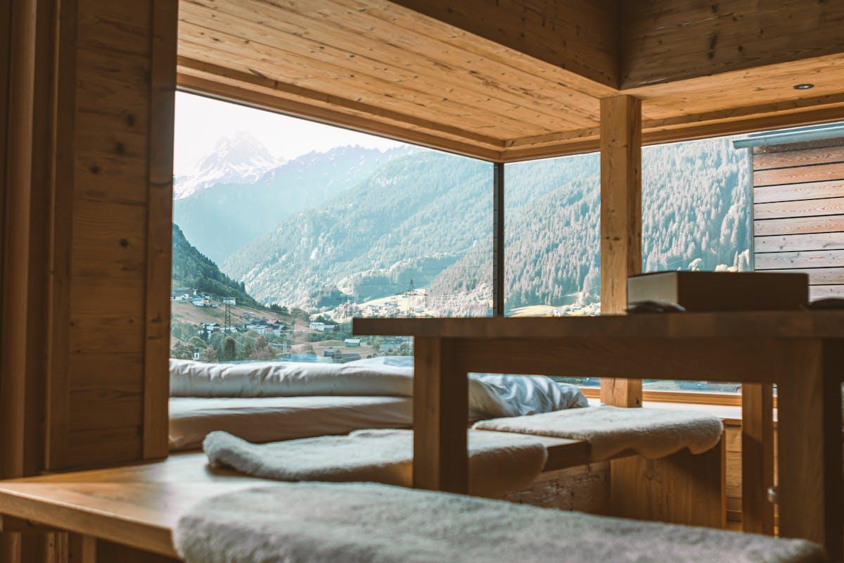 Premium European-style window wall in a luxury mountain home interior